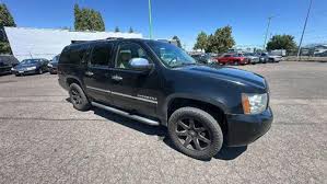 Image result for Black Granite 2012 Suburban