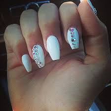 White Long Nails With Gems Nail And Manicure Trends These acrylic nail designs are glamorous and unique, giving you the inspiration you'll need to create your own fabulous designs for that special occasion.