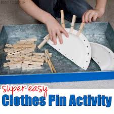 These clothespin activities from lalymom are inexpensive, portable, and perfect for building fine motor skills. Easy Clothes Pin Activity Busy Toddler