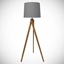 The tripod style black metal base features bronze accents and a white drum shade for excellent color contrast and light dispersion. Tripod Lamp Sainsburys Wooden Tripod Floor Lamp Floor Lamp Tripod Floor Lamp Living Rooms