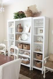 Styling A Bookshelf Using Neutrals Dining Room Bookshelves Hmm Coastal Dining Room Cottage Dining Rooms Home Decor