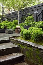 Inspired By The Gardens Of Ireland This Courtyard Features Antique Bluestone Sidewalk Paving Slabs A Fountain Townhouse Garden Garden Design Outdoor Gardens