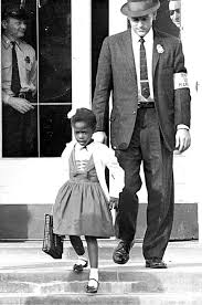 U S Marshals Escorting The Brave Ruby Bridges One Of The First African Americans To Attend A White Scho Histoire Des Noirs Photos Historiques Gens De Couleur