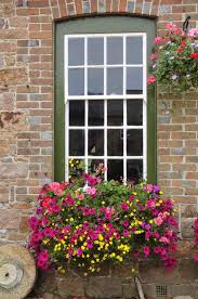 32 Stunning Flower Box Ideas Arrangements Window Box Window Box Flowers Gorgeous Window Boxes