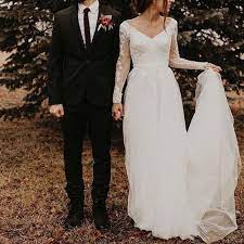 Long Sleeve Wedding Dress With Low Back David S Bridal Davids Bridal Wedding Dresses Long Sleeve Wedding Wedding Dress Long Sleeve