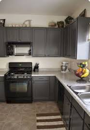 Doors and drawers need to be removed. 15 Grey Kitchen Cabinet Makeover Ideas Godiygo Com Grey Kitchen Cabinets Kitchen Design Painting Kitchen Cabinets
