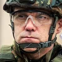 U.S. Army Staff Sgt. Daniel Hunnel stands for the roll