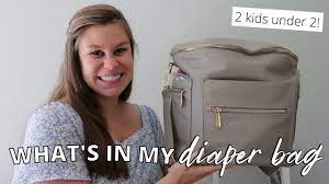 They even have their own shelf! What S In My Diaper Bag 2 Kids Under 2 Fawn Design Diaper Bag Dupe Miss Fong Diaper Bag Review Youtube