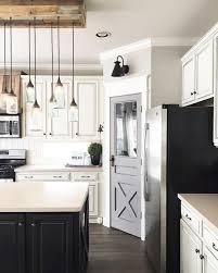 White Kitchen Cabinets Black Island Gray Painted Pantry Door In Farmhouse Style Farmhouse Style Kitchen Modern Farmhouse Kitchens Farmhouse Kitchen Cabinets