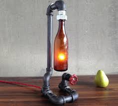 Growler bottles are not included in kits. This Vintage Lamp Is Made Using An Old Antique Beer Bottle Along With Some Industrial Piping And Is Illuminated By A Low Watt Beer Bottle Lamp Bottle Lamp Lamp