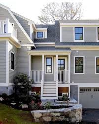 This Is Pretty With The Dark Windows If We Can Go Light Enough Do Not Want Blah Beige Looking Gray House Exterior Weatherboard House Hamptons House