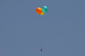 A small fire burns in a field after palestinians in gaza sent incendiary balloons over the border between gaza and israel, near nir am, southern israel, june 15,2021. Incendiary Balloons Return Balloon Units Threaten More Launches The Jerusalem Post