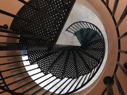 Does the cost differ for example, a helical spiral staircase enclosure with a glass or metal balustrade and bamboo treads is. Spiral Stairs Spiralworks Pty Ltd