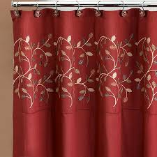 Elegant shower curtains punctuate the room with a fresh, inviting feel. Aubury Fabric Shower Curtain