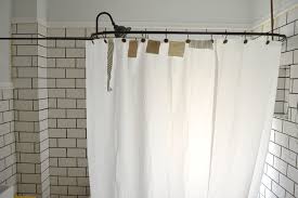 If the curtain has more stubborn stains, scrub them again with baking soda until the stains are gone, then rinse again. A Diy Clawfoot Tub Shower Curtain For Your Clawfoot Tub Shower Combo The White Apartment