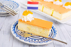 Het is bijna koningsdag en daar hoort natuurlijk een typisch oranje recept bij namelijk een oranje tompouce! Orange Tompouce Traditional Dutch Pastry On A Rustic Table Photograph By Sara Winter