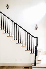 It was common in the colonial era, yet is a popular choice in modern decor staircases today. How We Completely Updated Our Stair Railings By Only Swapping Out The Balusters Chris Loves Julia