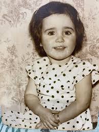 My wonderful mum and Dad ,and me as a little girl with mum and ??