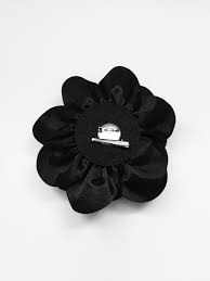 black flower brooch