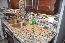 This particular type of granite is known for the icy, or glacial, look that it has. Alaska White Granite Kitchen Countertops From Canada Stonecontact Com