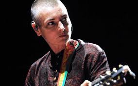 Sinead O'Connor threatens bishop occupying her church
