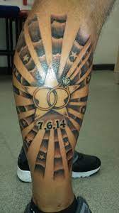 Wedding Tattoo Wedding Rings Tattoo Interlocking Rings Clouds Sun Rays Stars Calf Tattoo Personal Men With Tat Sun Rays Tattoo Star Tattoos Calf Tattoo