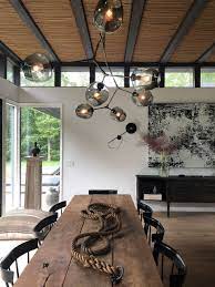 Tour The Mid Century Modern Retreat A Popular Lifestyle Blogger Calls Home Black And White Decor White Decor Modern Farmhouse Design