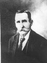 My Grandfather with then office girl, Marie outside his shop in Queen  Street Bendigo. About 1950.