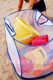 Use A Dollar Store Mesh Expandable Laundry Bag For Sand Toys So You Can Shake Out The Sand Instead Of Bringing It Home Beach Toys Sand Toys Beach Hacks
