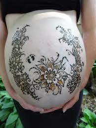 Prenatal belly painting is growing increasingly popular as a unique and beautiful way to celebrate new life, color, creativity, love and the divine feminine at her fullest stage in life. Henna Belly Art In Pregnancy
