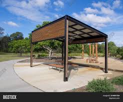 The landscaping all around your backyard pergola has a huge impact on the overall look of the structure. Modern Pergola Sitting Image Photo Free Trial Bigstock