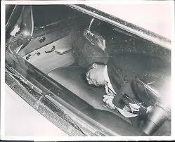 Jury sees graphic photos of victims' wounds. Crime