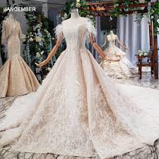 Trova gli abiti da sposa economici online in italia? Vendita Calda 50 Di Sconto Htl781 Nuovi Abiti Da Sposa Con Piuma Con Spalle Scoperte Scollo A Barchetta Abito Da Sposa Negozio Online Cina Vestido De Noiva Di Fascia Alta