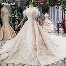 Inoltre, progettiamo abiti da sposa in pizzo, tulle, chiffon, mikado o qualsiasi altro tessuto di alta qualità. Vendita Calda 50 Di Sconto Htl781 Nuovi Abiti Da Sposa Con Piuma Con Spalle Scoperte Scollo A Barchetta Abito Da Sposa Negozio Online Cina Vestido De Noiva Di Fascia Alta