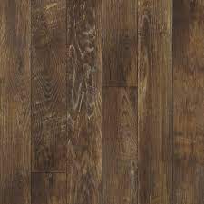 Lifeproof luxury vinyl planks feature authentic embossing. Hampton Bay Country Oak Dusk 12 Mm Thick X 6 3 16 In Wide X 50 1 2 In Length Laminate Flooring 17 40 Sq Ft Case 195144 The Home Depot Mannington Laminate Flooring Laminate Plank Flooring House Flooring
