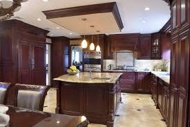 Check out how intense the contrast of black cabinets with a white backsplash is in this look reinforced with gallery space! What Color Countertops Go With Dark Cabinets Kitchen Infinity