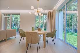 The dining room is a centrepiece of the modern family home. Hd Wallpaper Round Brown Wooden 5 Piece Dining Set In Room Chairs Clean Wallpaper Flare