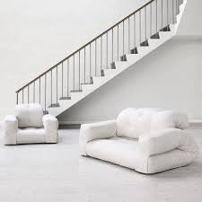 The word 'futon' commonly refers to a type of furniture that can convert between a bed and a sofa. Hippo An Armchair Or A Sofa That Turns Into A Comfortable Extra Futon Bed In Seconds Nordic Design