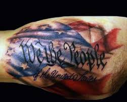 Coloured american flag design on the arm. 140 Patriotic We The People Tattoo Designs With Meaning And Ideas Body Art Guru