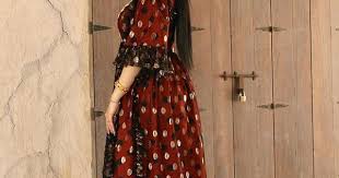 image may contain 1 person standing maxi dress fashion women