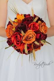 These 9 fall diy wedding bouquets are a great way to incorporate some gorgeous flowers without shelling out some big bucks for a florist. Rustic Fall Wedding Bouquet With Burnt Orange Wine And Burgundy Roses Made With Fake Fl Wedding Bouquet Fake Flowers Bridal Bouquet Fall Orange Wedding Flowers