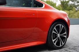 Image result for Fire Red 2012 Aston Martin