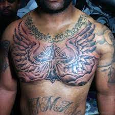 Copy this code to embed this photo on your site large image: 81 Alluring Wings Tattoo On Chest