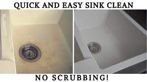 For preventing stains from becoming permanent in the sink, it is important to clean it every day after use. Cleaning A White Granite Composite Sink No Scrubbing Youtube