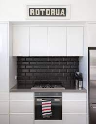 Installing a tile backsplash can add timeless beauty to your home. Square Black Kitchen Splashback Tiles Google Search Kitchen Splashback Tiles Kitchen Tiles Design Kitchen Splashback