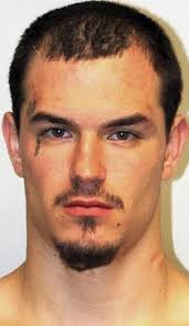 Police charge suspect in 2 knifepoint robberies