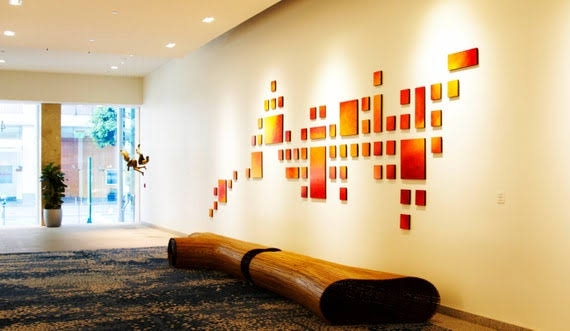 Large-scale installations anchor contemporary healthcare architecture and welcome visitors., AI generated