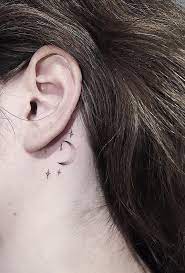 Faded Dotwork Style Behind The Ear Moon And Stars Tattoo Art Deco Stars Delicate Star Tattoos Behind Ear Tattoos Tattoos