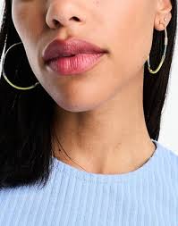 And other stories & large hoop earrings in gold with yellow and turquoise  detail