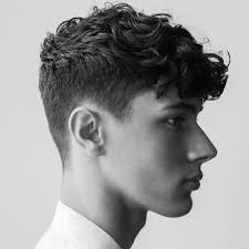 Luckily for you, curly hair for men has never been as coveted as it is right now and it just so happens that the a sleek, slick take on the taper comb over haircut, this smart look is ideal for when you want to precise taper comb over haircut. Wavy Hairstyles For Men 50 Waves Ways To Wear Yours Men Hairstyles World